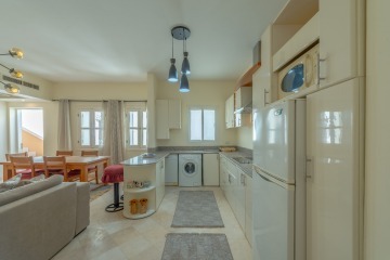 Fully equipped kitchen with washing machine, kettle and toaster