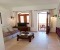 Living room with sofa and access to terrace