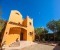 Entrance to the villa with parking space