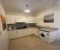 Fully equipped kitchen with washing machine, microwave, toaster, kettle and coffee machine