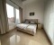 King sized bed with plenty of lighting and high domed ceilings