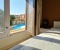 Bedroom with a direct view of the pool