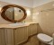 Bathroom with large mirror