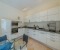 Fully equipped kitchen with microwave, oven, nespresso machine and kettle