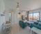 Lightful modern living room with breakfast corner