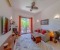 Living room with access to the terrace and large TV