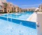 Large shared pool with sun loungers