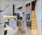 Modern apartment with open kitchen, living room and extra loft bed