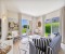 Cozy, bright living room with view to the garden and lagoon