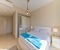 Bedroom with air conditioning andwardrobe with large mirrors