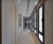 Hallway with a spacious built-in wardrobe and washing machine