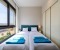 Bedroom 3 with large wardrobe and view