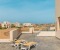 Private rooftop pool with sun loungers and breathtaking views over the lagoon