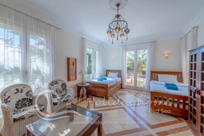 Bedroom #3 with two single beds and two extra extendable mattresses