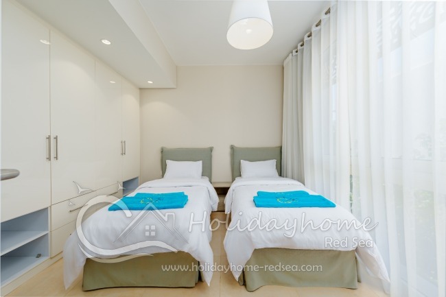 Bedroom 2 with two single beds