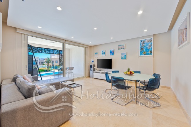 Beautifully decorated living room and dining area.