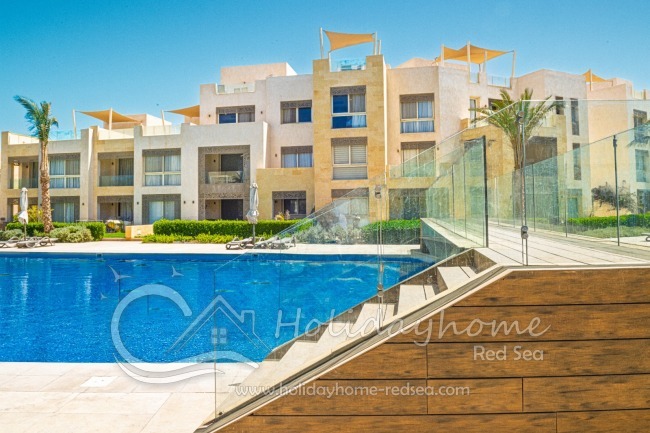 Apartment on the first floor and bridge over the large pool