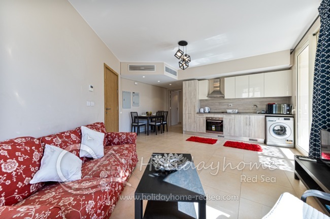 Open living room with kitchen and dining table