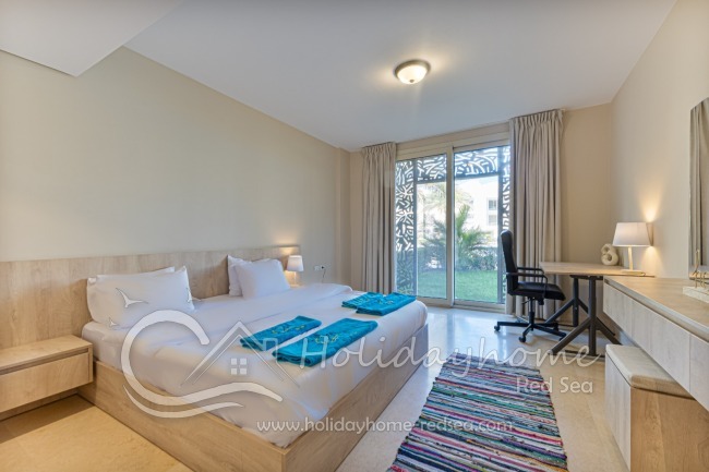 Bedroom 1 with double bed and work space