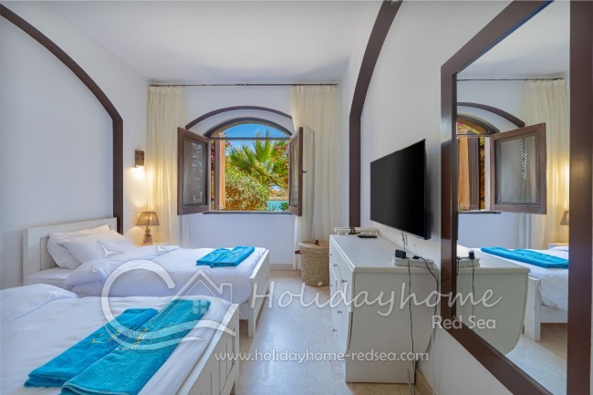 Bedroom 1 with two single beds 
