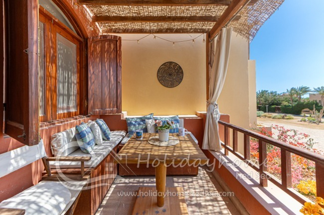 Balkony with comfortable sitting area 