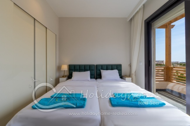 Bedroom 2 with large wardrobe and balcony with beautiful view