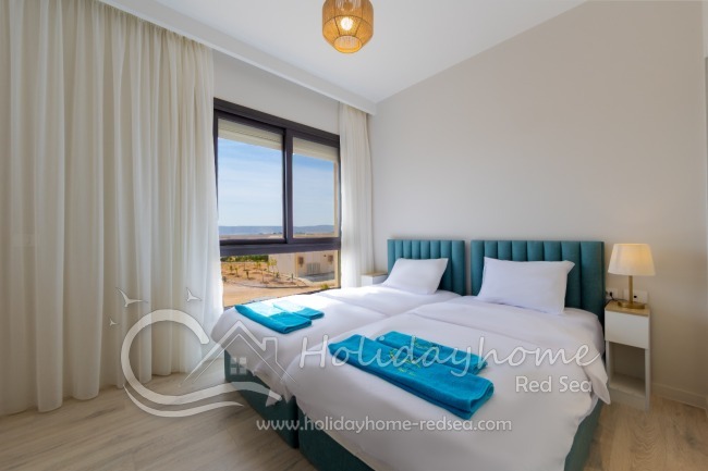 Bedroom 3 with comfortable single beds 